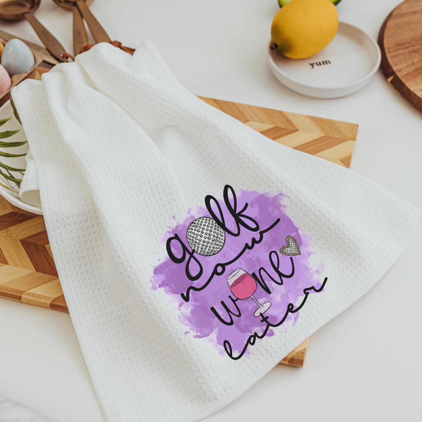 Golf now wine later funny golf kitchen towel in use