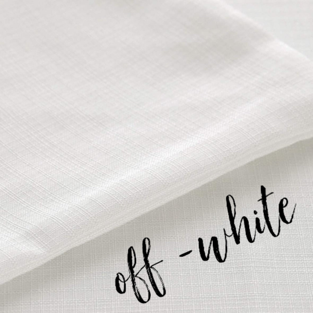 a close-up view of a white fabric, with the word "off" written in cursive text next to it.