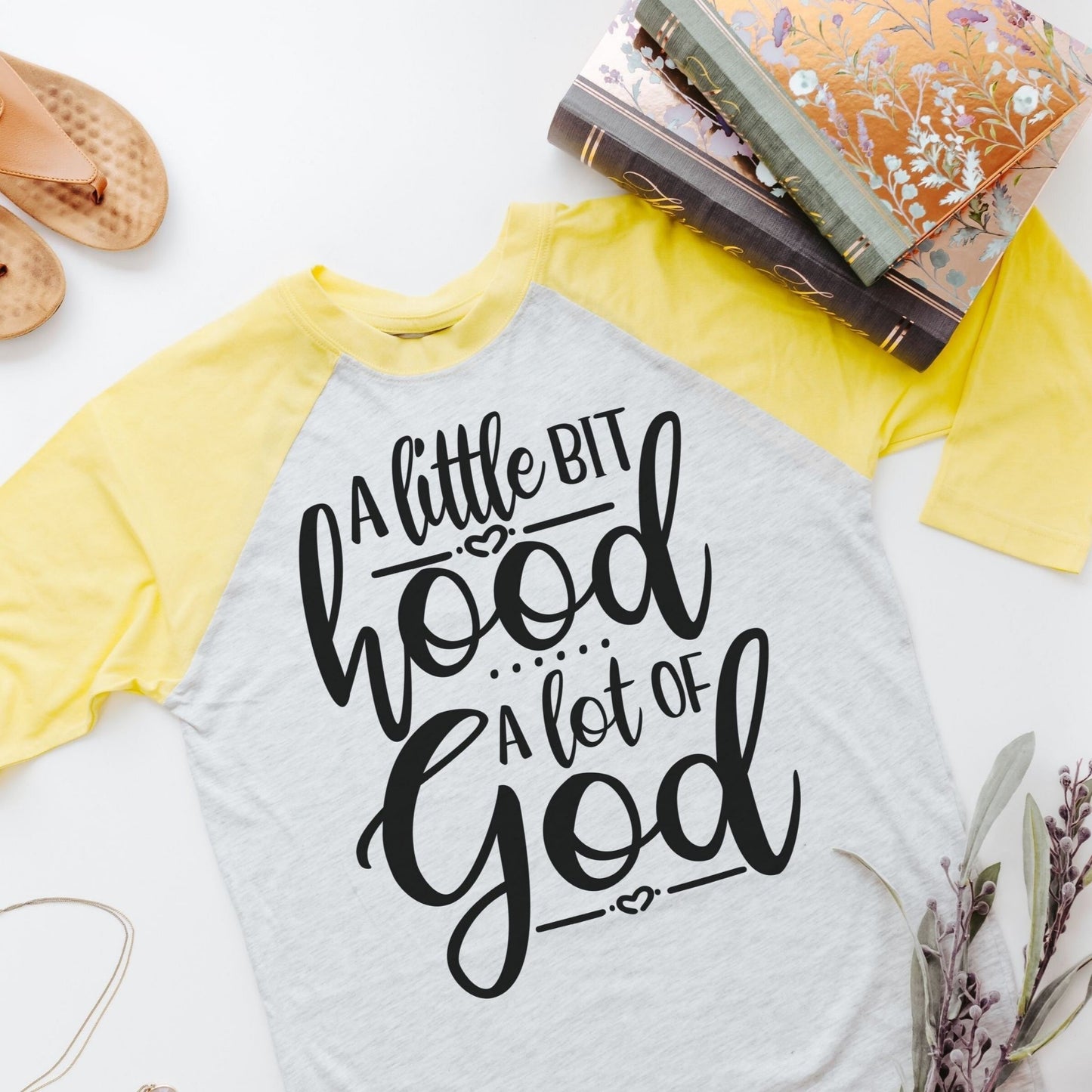 A little bit hood a lot of God shirts